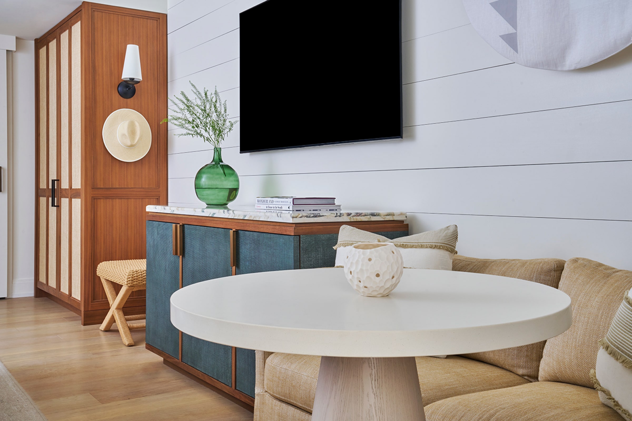 this image depicts a hotel room with a table and chairs