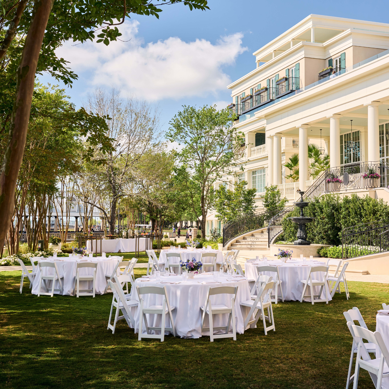 image of the Grand Lawn at The Cooper with round tables set up