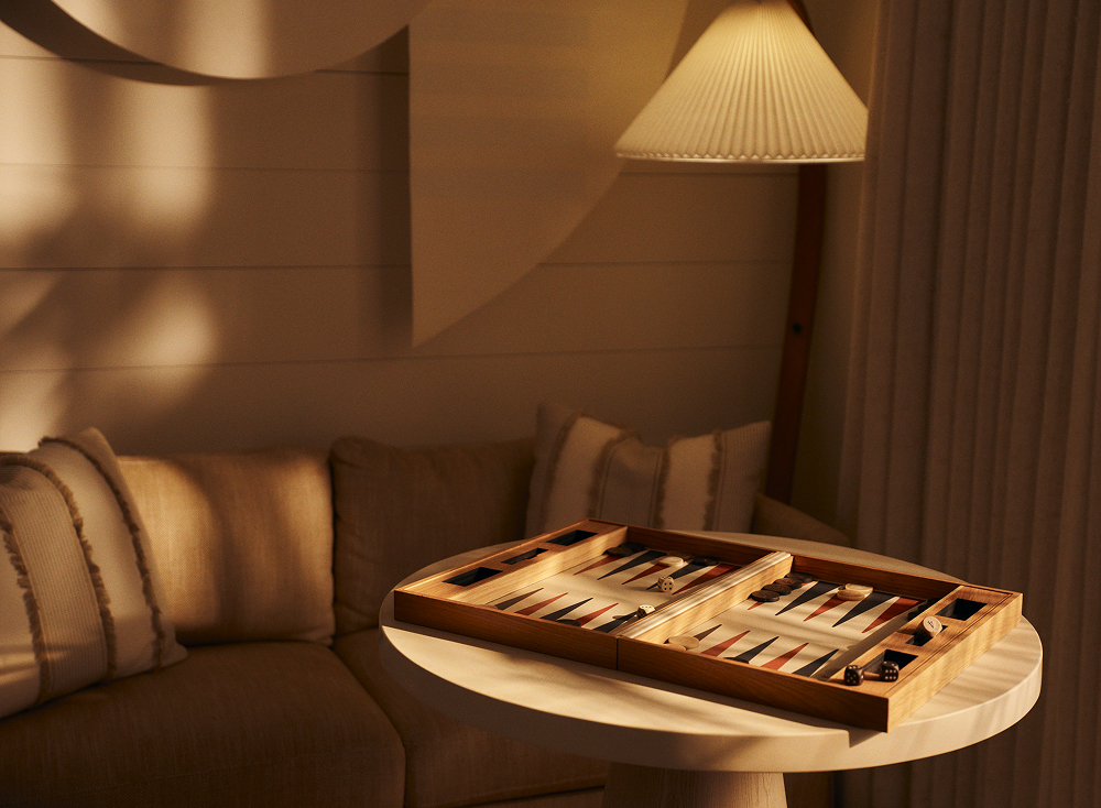 this image depicts a game on a table beside a couch