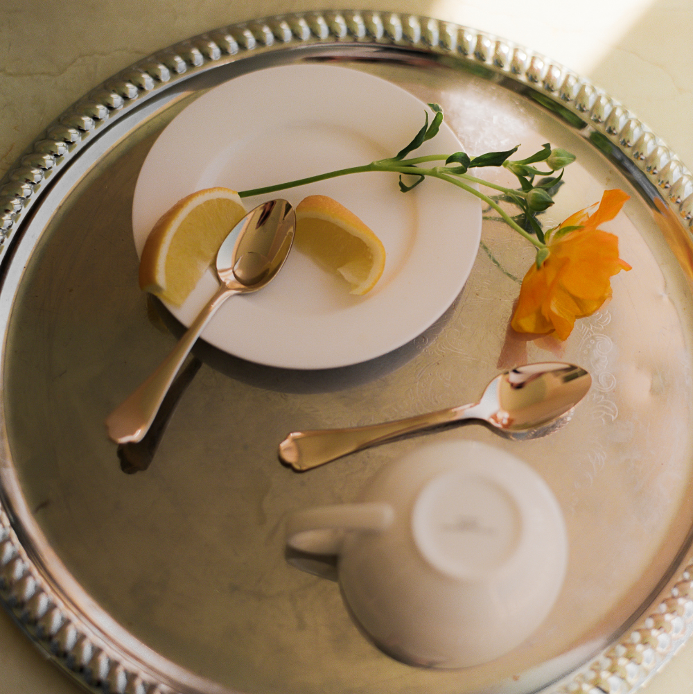 Image of sliver platter with teacup